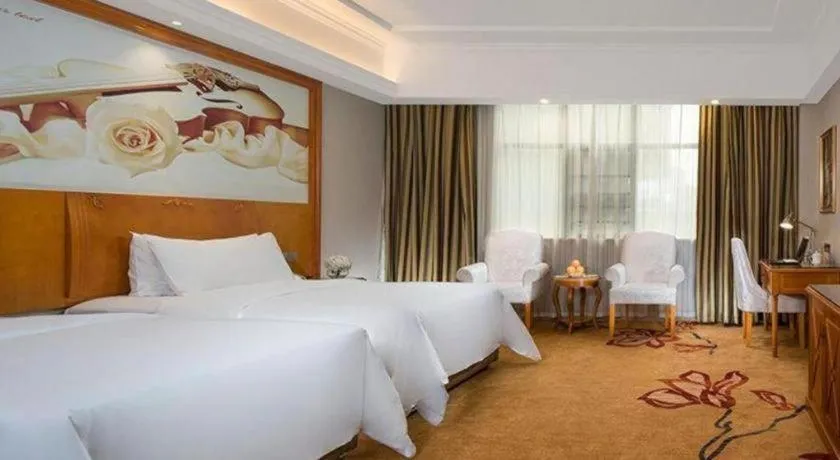 Bed in Vienna Hotel Hunan Shaoyang South Railway Station