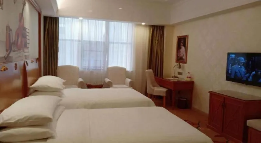 Bed in Vienna Hotel Hunan Shaoyang South Railway Station