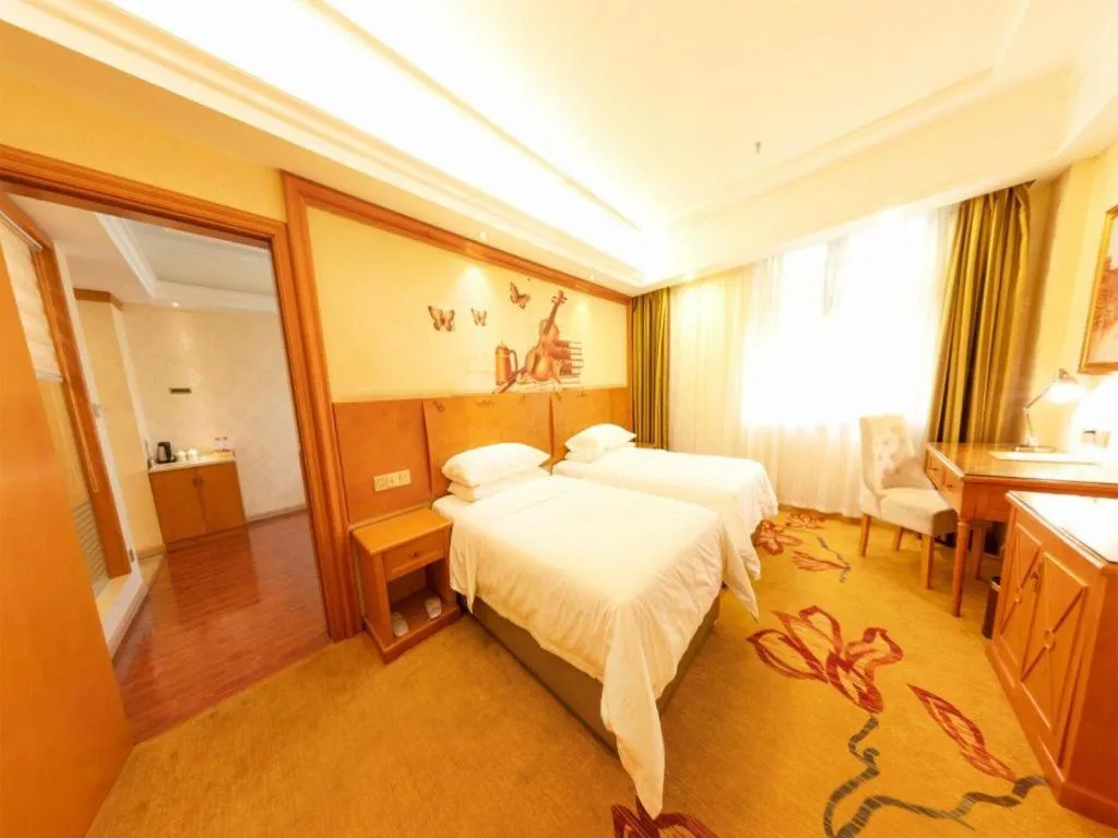 Bed in Vienna Hotel Hunan Shaoyang South Railway Station