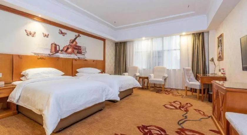 Bed in Vienna Hotel Hunan Shaoyang South Railway Station