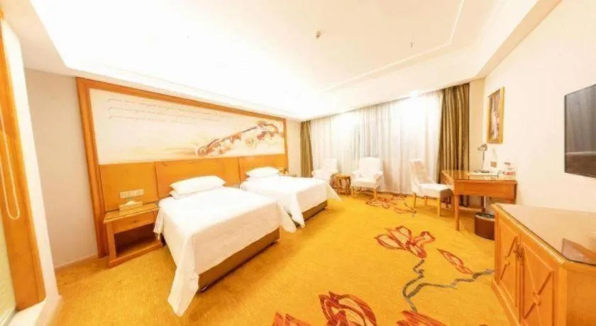 Bed in Vienna Hotel Hunan Shaoyang South Railway Station