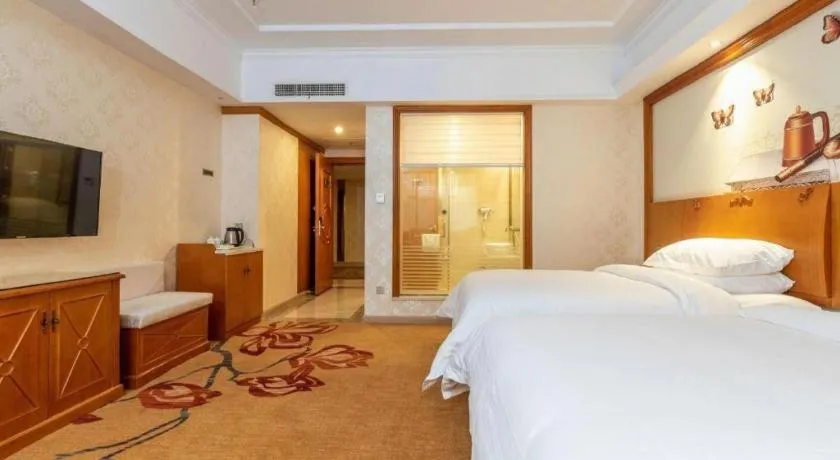 Bed in Vienna Hotel Hunan Shaoyang South Railway Station