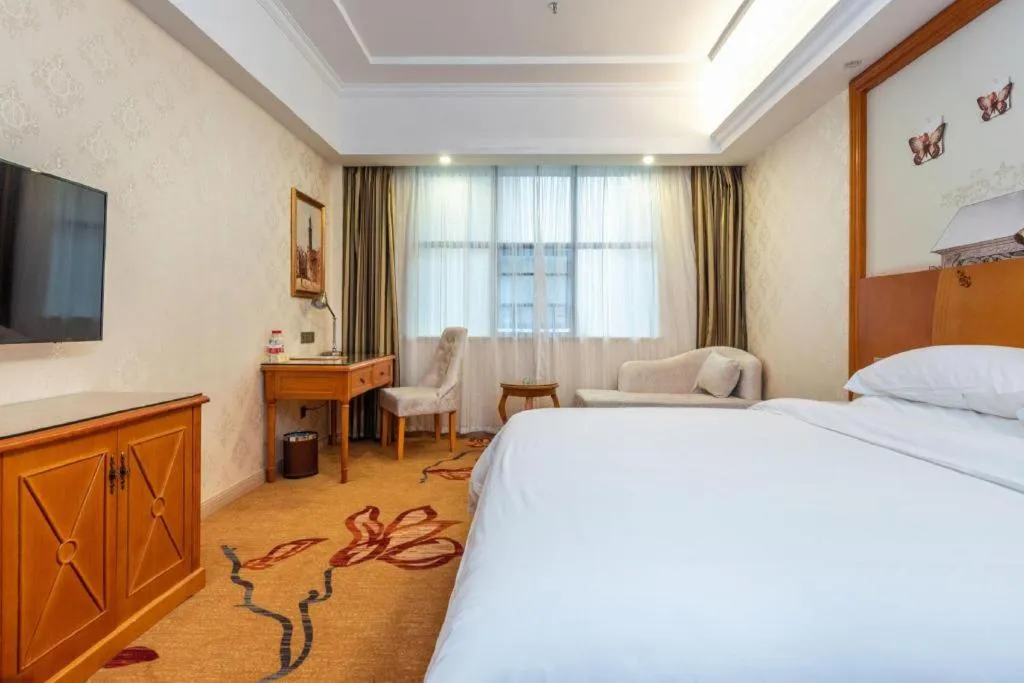 Bed in Vienna Hotel Hunan Shaoyang South Railway Station