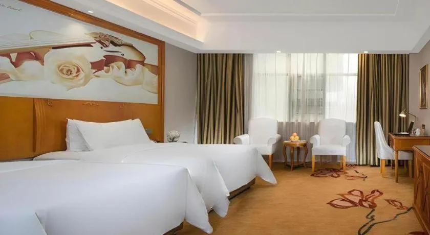 Bed in Vienna Hotel Hunan Shaoyang South Railway Station