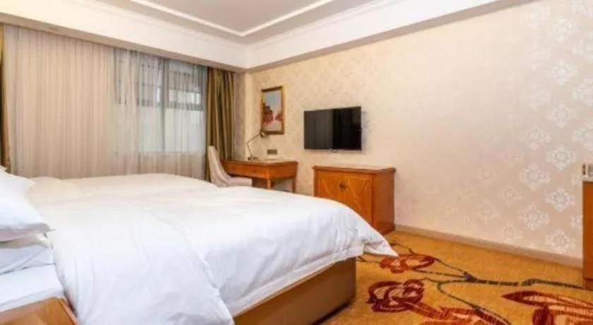 Bed in Vienna Hotel Hunan Shaoyang South Railway Station