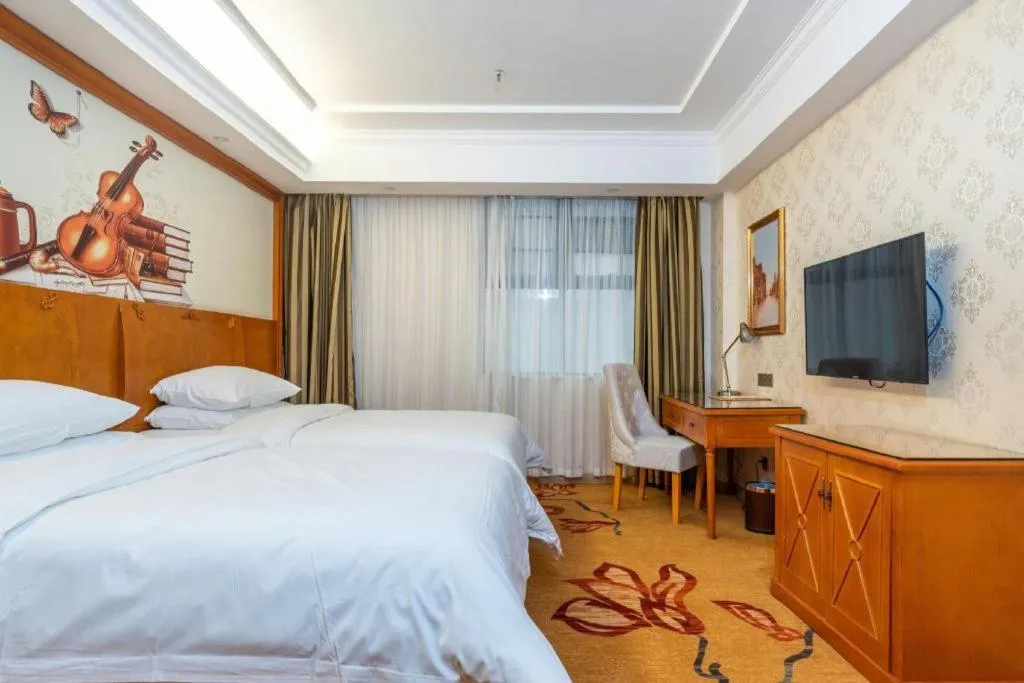 Bed in Vienna Hotel Hunan Shaoyang South Railway Station