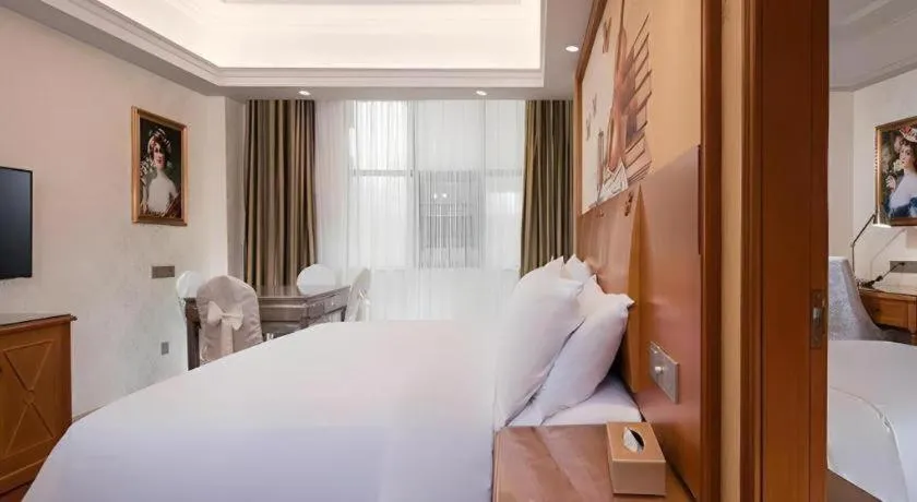 Bed in Vienna Hotel Hunan Shaoyang South Railway Station