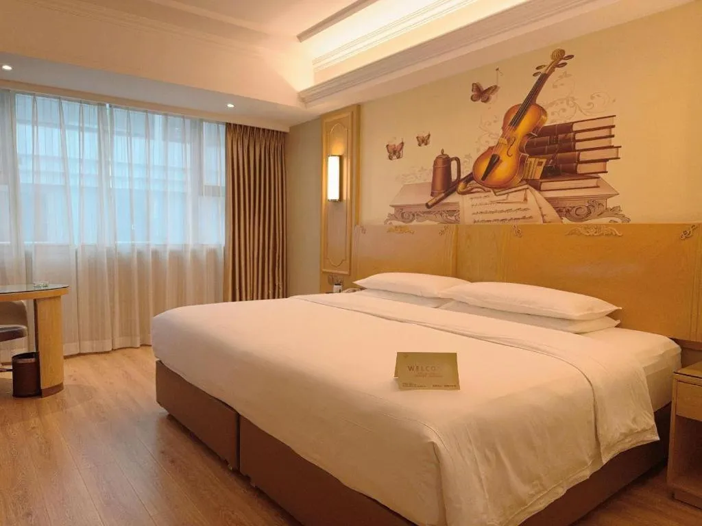 Bed in Vienna Hotel Chongqing Jiefangbei Hongyadong