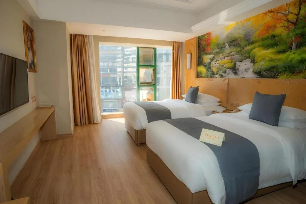 Bed in Vienna Hotel Chongqing Jiefangbei Hongyadong