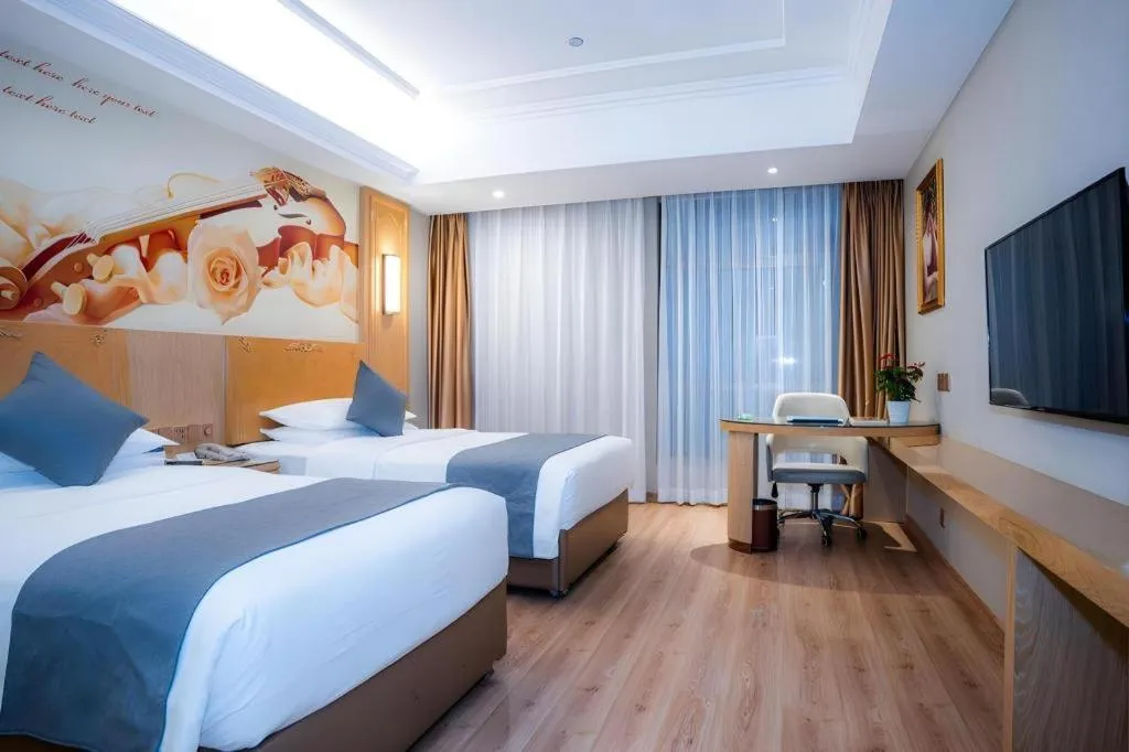 Bed in Vienna Hotel Chongqing Jiefangbei Hongyadong