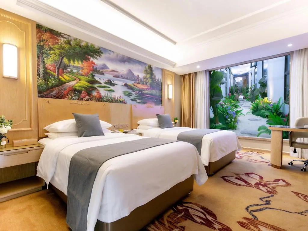 Bed in Vienna Hotel Chongqing Jiefangbei Hongyadong