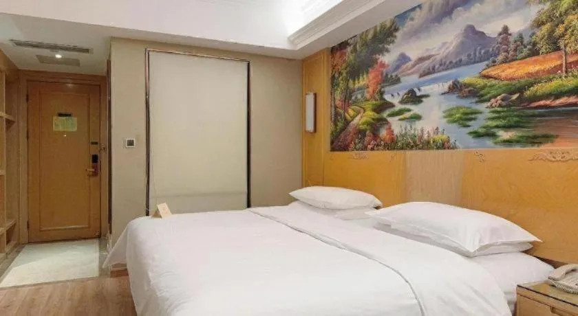 Bed in Vienna Hotel Chongqing Jiefangbei Hongyadong