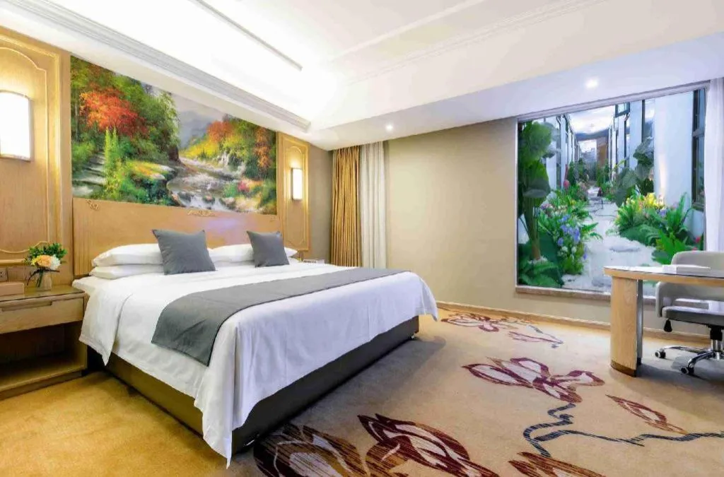 Bed in Vienna Hotel Chongqing Jiefangbei Hongyadong