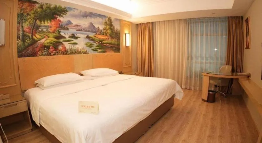 Bed in Vienna Hotel Chongqing Jiefangbei Hongyadong