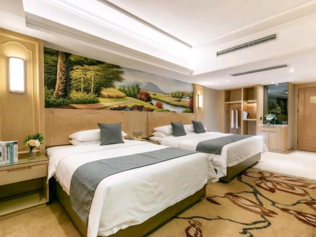 Bed in Vienna Hotel Chongqing Jiefangbei Hongyadong