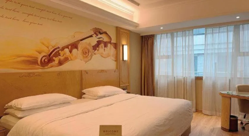 Bed in Vienna Hotel Chongqing Jiefangbei Hongyadong