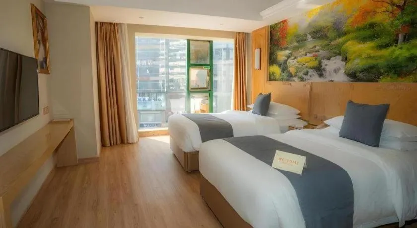 Bed in Vienna Hotel Chongqing Jiefangbei Hongyadong