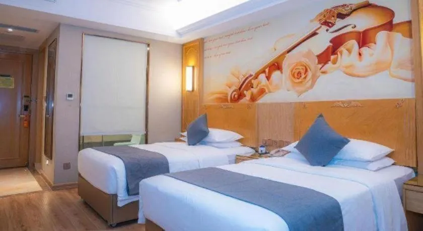 Bed in Vienna Hotel Chongqing Jiefangbei Hongyadong