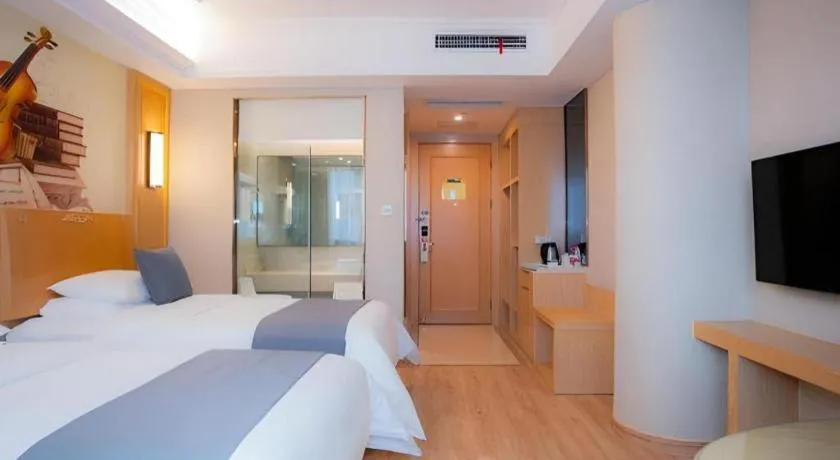 Bed in Vienna Hotel Chongqing Jiefangbei Hongyadong