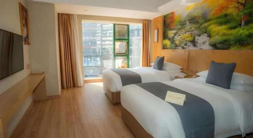 Bed in Vienna Hotel Chongqing Jiefangbei Hongyadong