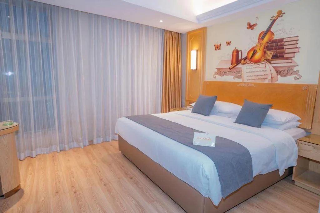 Bed in Vienna Hotel Chongqing Jiefangbei Hongyadong