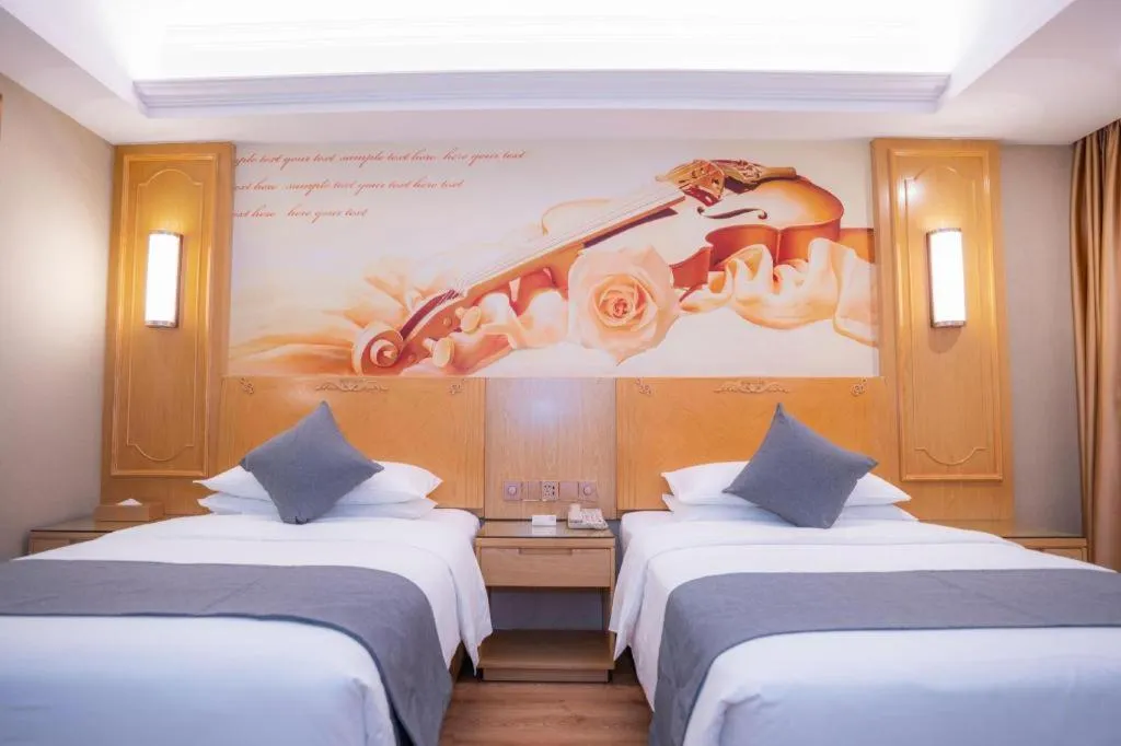 Bed in Vienna Hotel Chongqing Jiefangbei Hongyadong