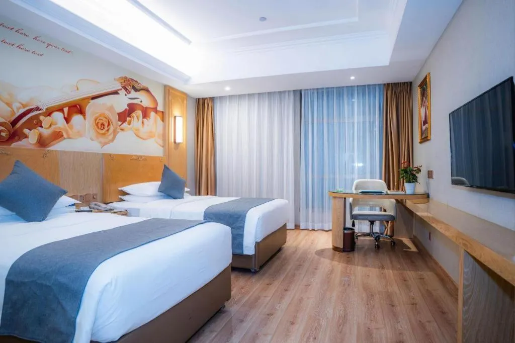 Bed in Vienna Hotel Chongqing Jiefangbei Hongyadong