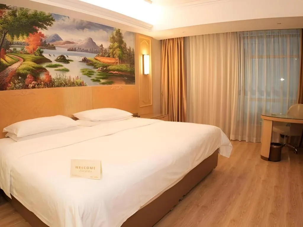 Bed in Vienna Hotel Chongqing Jiefangbei Hongyadong