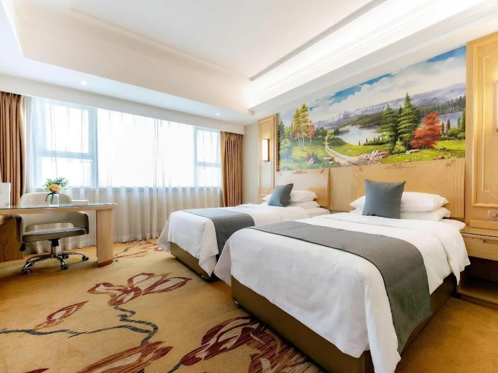 Bed in Vienna Hotel Chongqing Jiefangbei Hongyadong