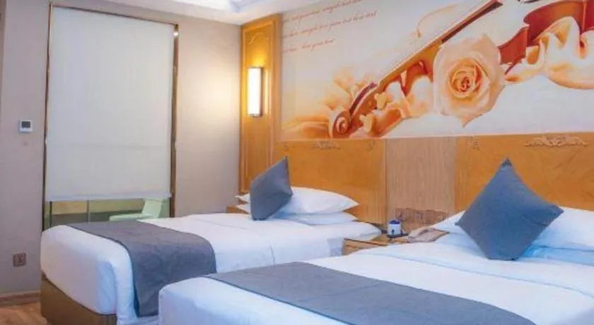 Bed in Vienna Hotel Chongqing Jiefangbei Hongyadong