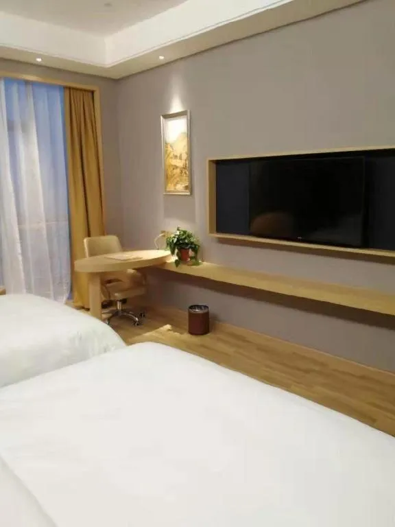 Bed in Vienna Hotel Anhui Lujiang International Building Materials Market Wuzhong