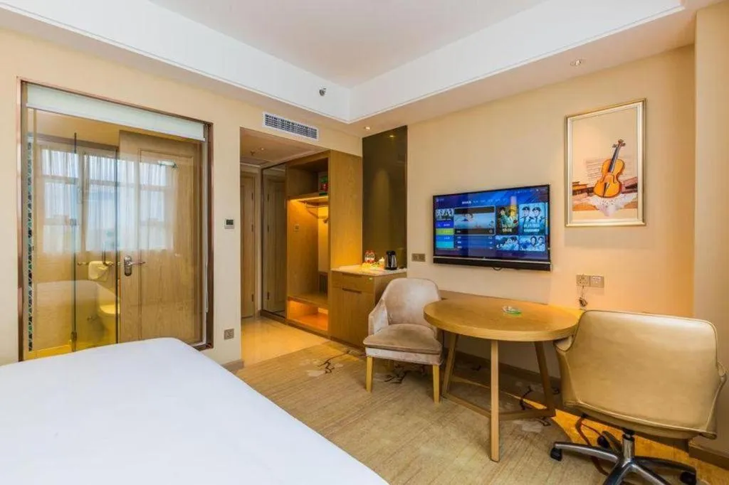 Bed in Venus International Hotel Guangdong Meizhou Fengshun Huamao Hot-Spring