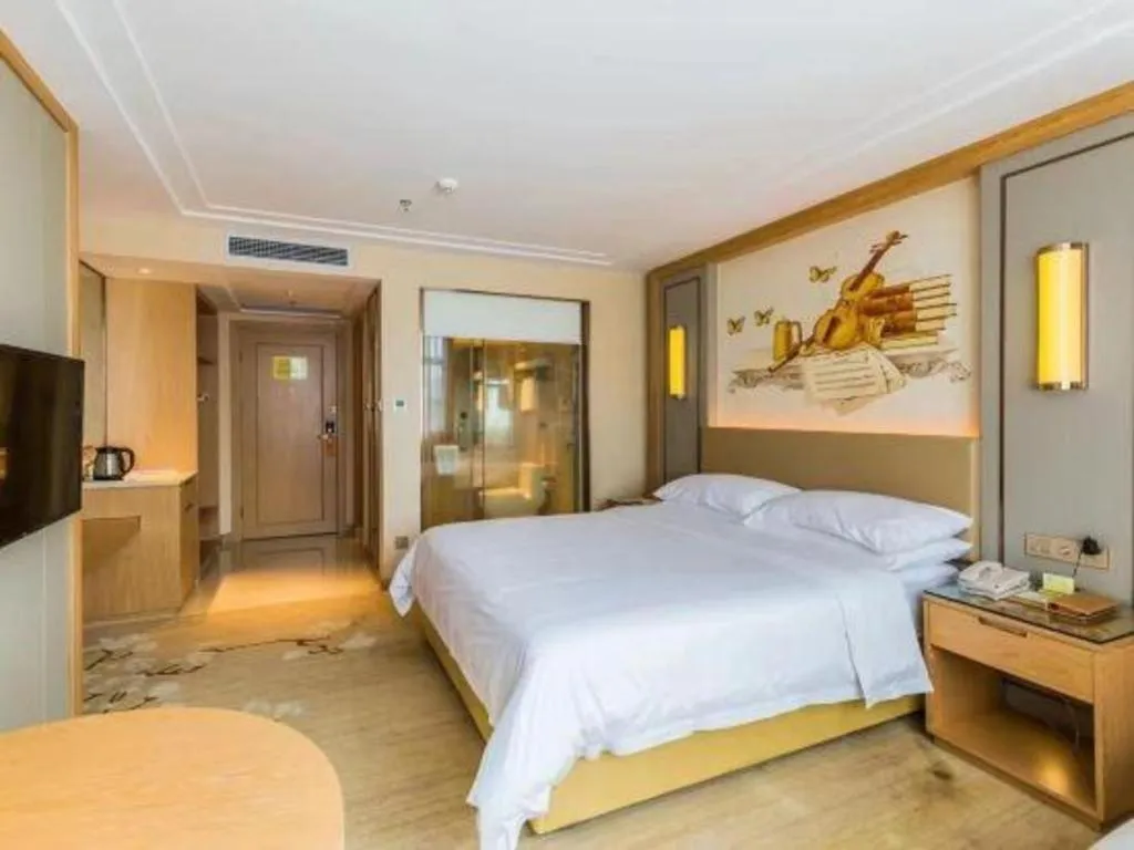 Bed in Venus International Hotel Guangdong Meizhou Fengshun Huamao Hot-Spring