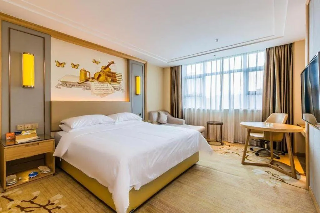 Bed in Venus International Hotel Guangdong Meizhou Fengshun Huamao Hot-Spring