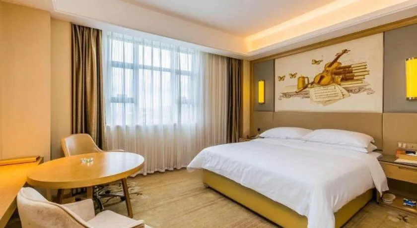 Bed in Venus International Hotel Guangdong Meizhou Fengshun Huamao Hot-Spring