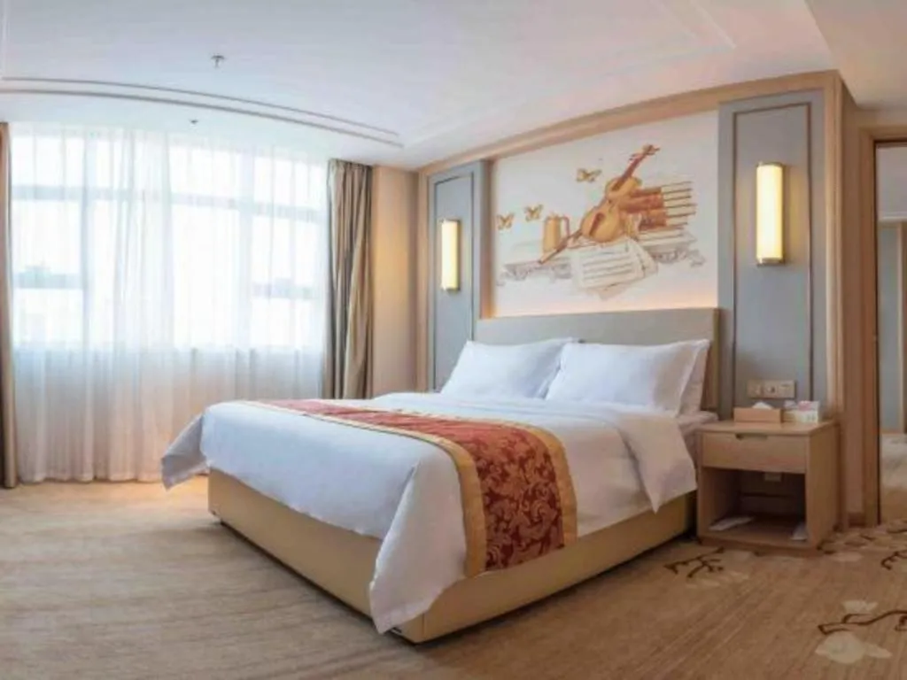 Bed in Venus International Hotel Guangdong Meizhou Fengshun Huamao Hot-Spring