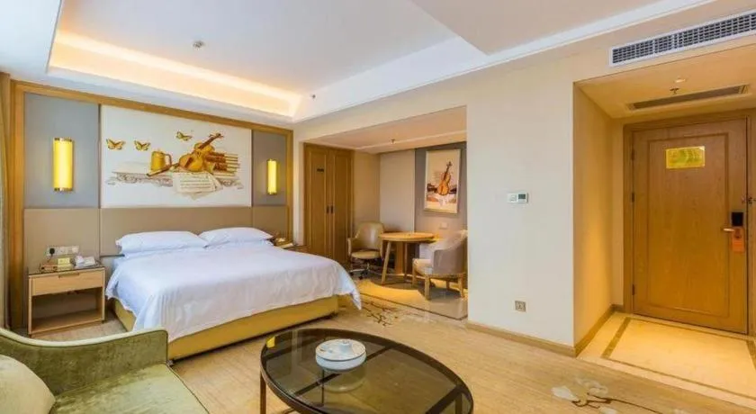 Bed in Venus International Hotel Guangdong Meizhou Fengshun Huamao Hot-Spring