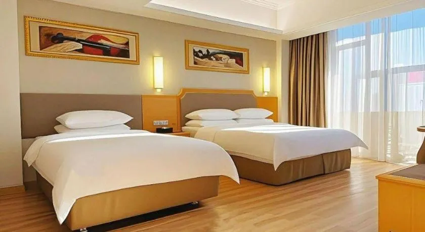 Bed in Vienna Hotel Guangdong Foshan Wenhua North Road
