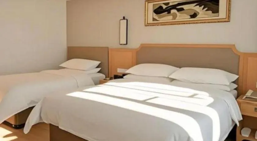 Bed in Vienna Hotel Guangdong Foshan Wenhua North Road