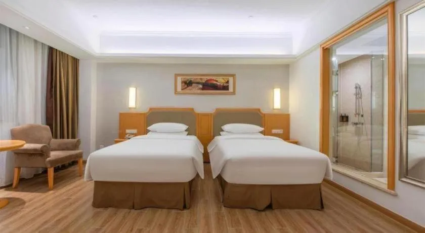 Bed in Vienna Hotel Guangdong Foshan Wenhua North Road