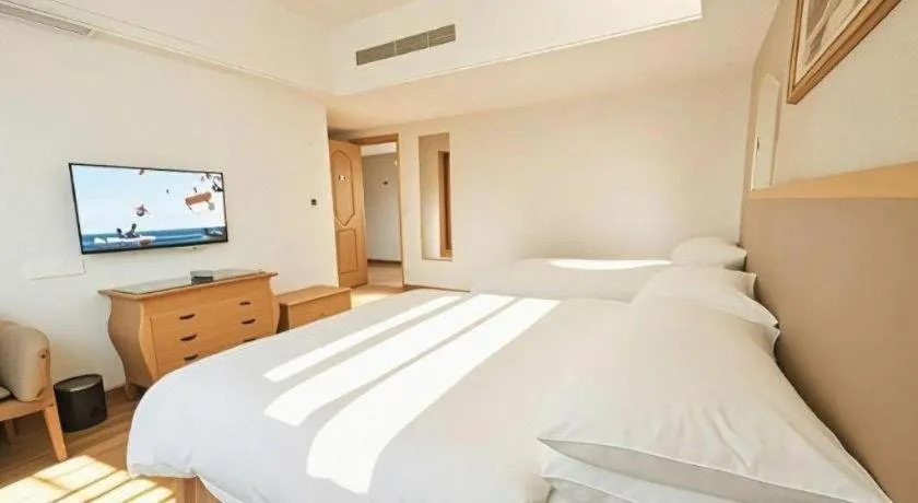Bed in Vienna Hotel Guangdong Foshan Wenhua North Road