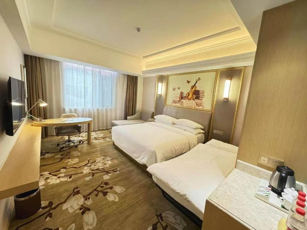 Bed in Vienna Hotel Shandong Qingdao Jiaodong International Airport Hai'er Avenue