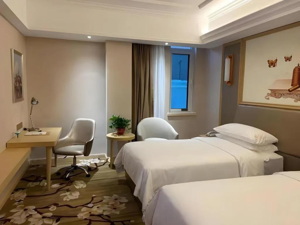 Bed in Vienna Hotel Shandong Qingdao Jiaodong International Airport Hai'er Avenue