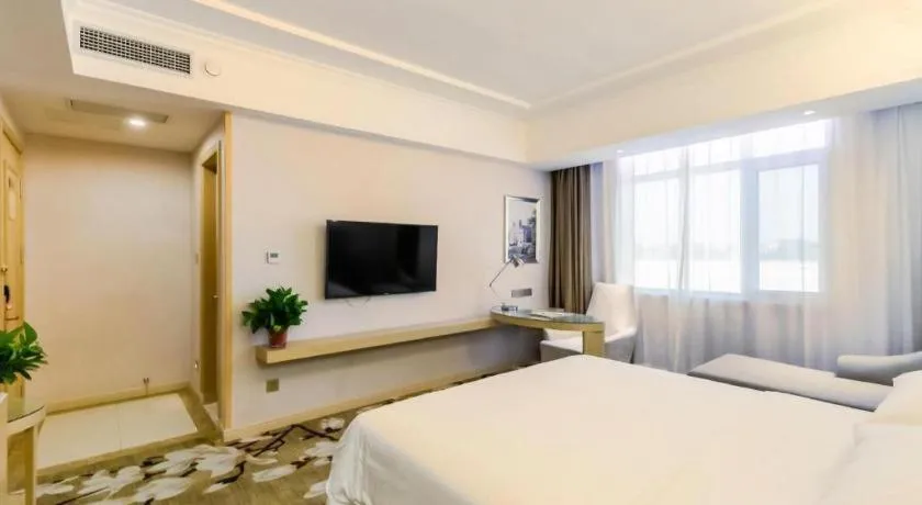 Bed in Vienna Hotel Shandong Qingdao Jiaodong International Airport Hai'er Avenue
