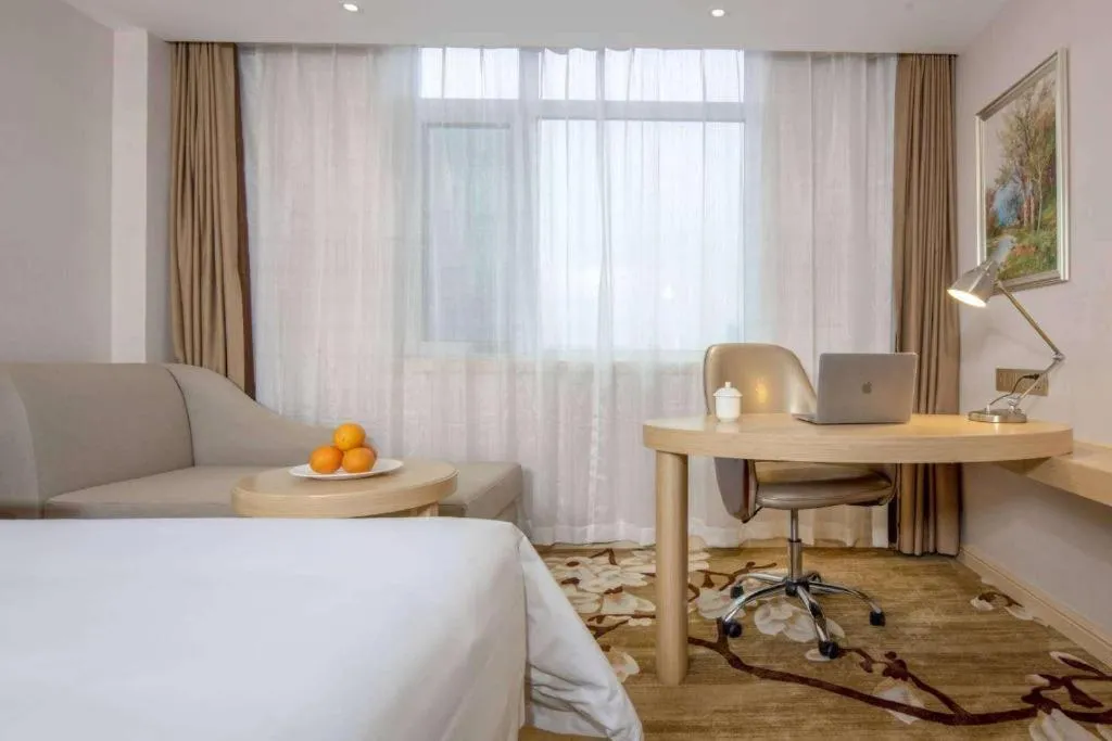 Bed in Vienna Hotel Shandong Qingdao Jiaodong International Airport Hai'er Avenue