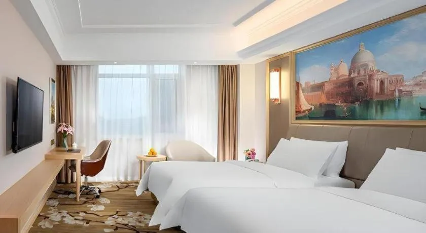 Bed in Vienna Hotel Shandong Qingdao Jiaodong International Airport Hai'er Avenue