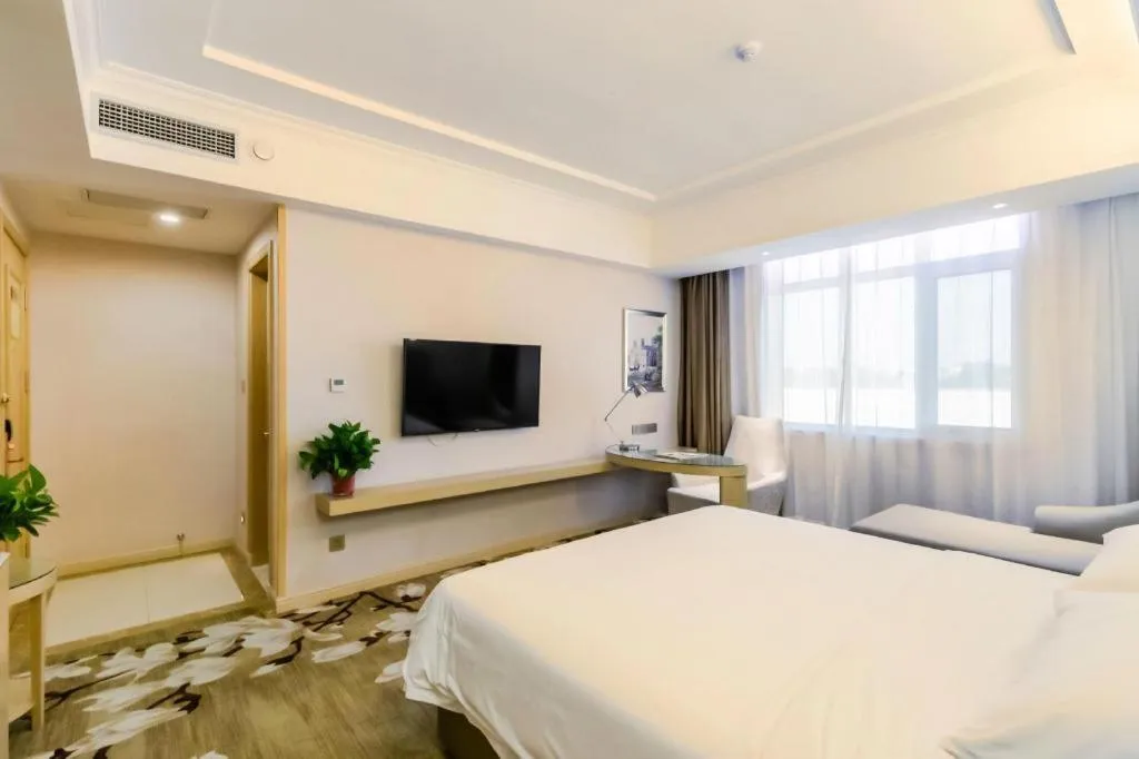 Bed in Vienna Hotel Shandong Qingdao Jiaodong International Airport Hai'er Avenue