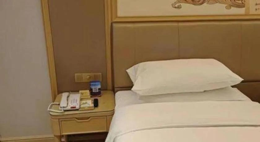 Bed in Vienna Hotel Shandong Qingdao Jiaodong International Airport Hai'er Avenue