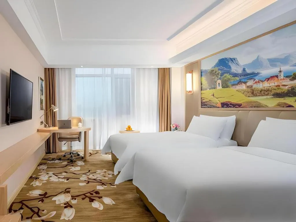 Bed in Vienna Hotel Shandong Qingdao Jiaodong International Airport Hai'er Avenue