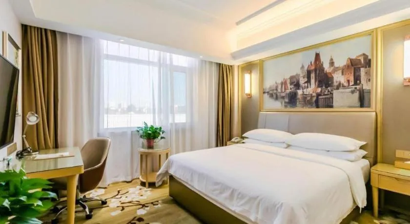 Bed in Vienna Hotel Shandong Qingdao Jiaodong International Airport Hai'er Avenue
